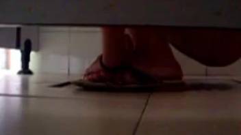 Smacking a female while she's defecating in the women's bathroom