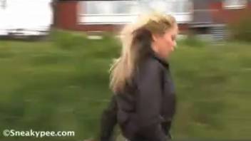 Stationary vehicle and urinating on the lawn