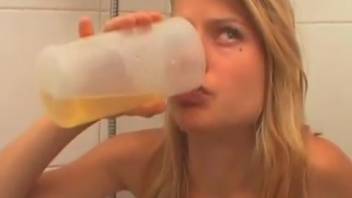 Female urinating and ingesting her own pee